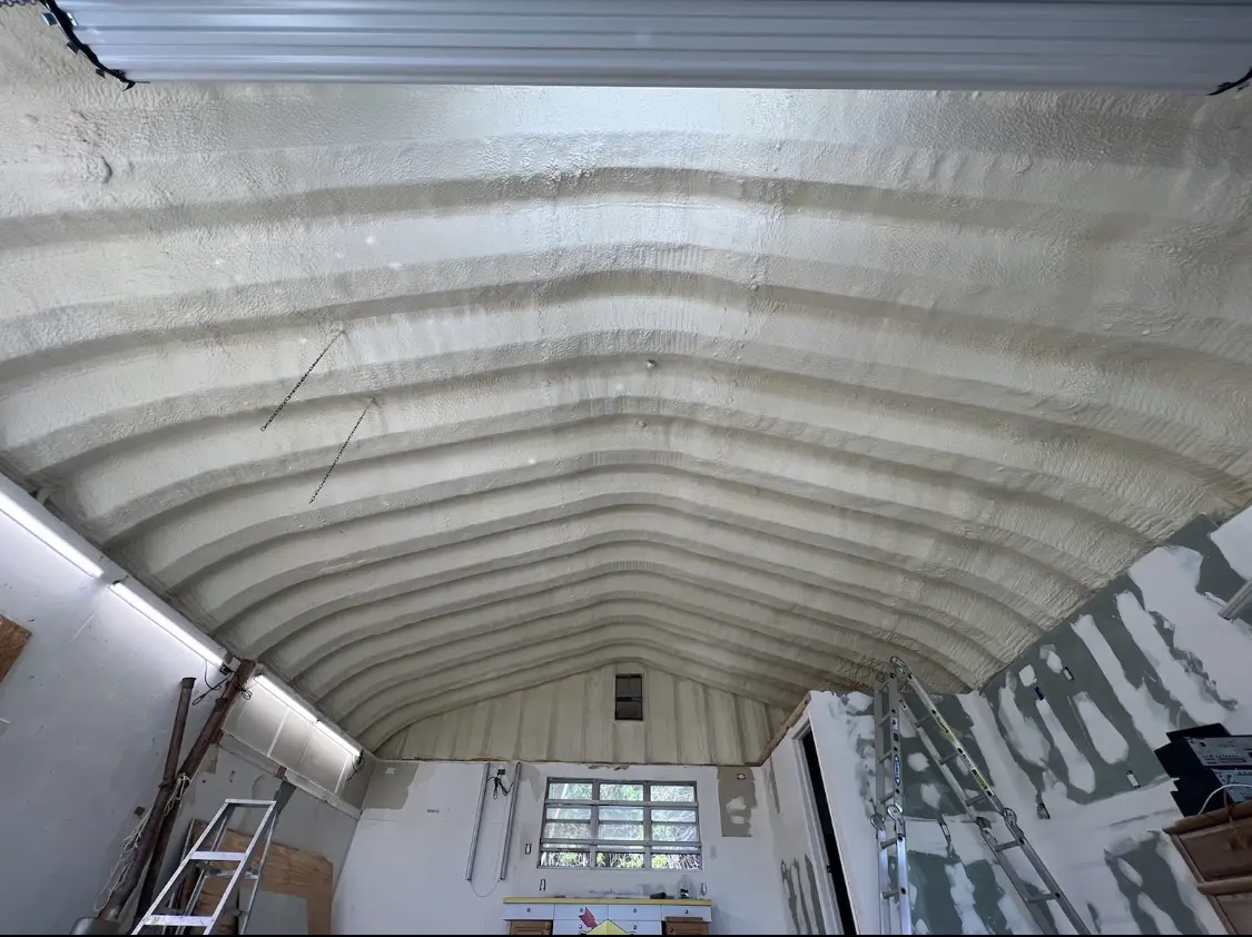 Spray polyurethane foam applied to the underside of a metal roof deck in Silver Springs